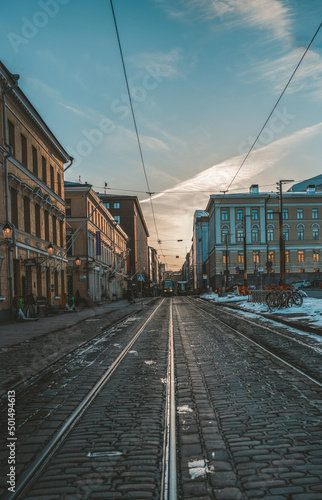 Vertical shot of a street with a city building at noon, Helsinki