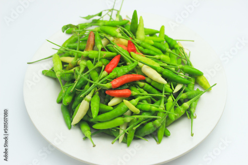 Green and Red Bird's Eye Chili Peppers. Isolated