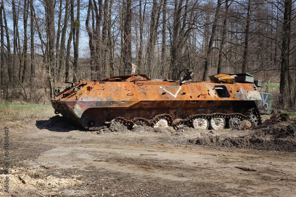 Military armored vehicles burned down. Army armored car blown up. Stock ...