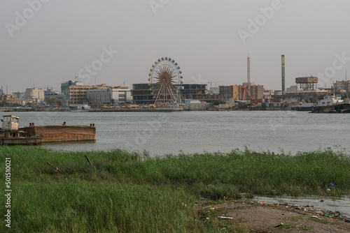 Basra, Iraq - April 15, 2022: landscape photo of the tour in river in basra city photo