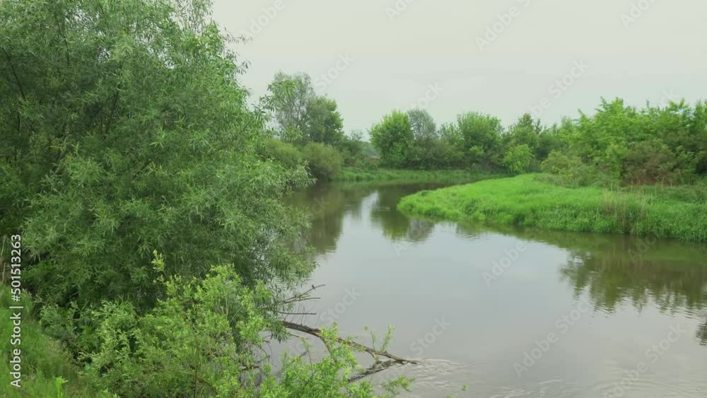 Sunrise on the river in the fog. Evening landscape with the last rays. Beautiful nature in summer Sunrise on the river in the fog. Evening landscape with the last rays. Beautiful nature in summer