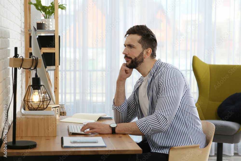 Online test. Man studying with computer at home Online test. Man studying with computer at home
