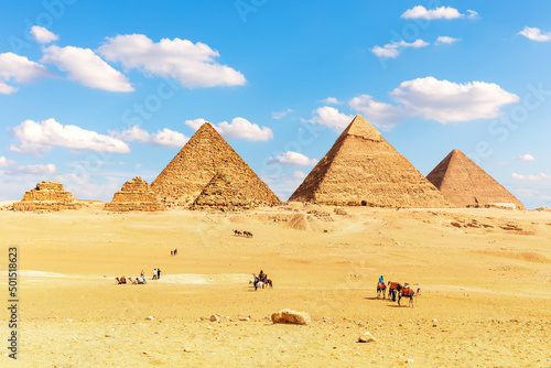 The Pyramids of Egypt and its companions in the sands of Giza desert, Africa © AlexAnton