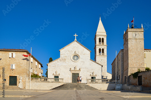 Catholic church under the blue sky in Supetar, Croatia photo