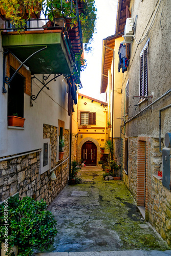 Alley between the old houses of Sezze, a medieval town in the Lazio region photo