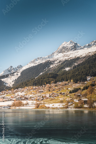 Vertical shot of a lake in Breil or Brigels, a municipality in Surselva, Switzerland photo