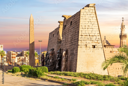 Obraz na płótnie Pylon with obelisk in Luxor Temple, beautiful sunset view, Egypt w salonie