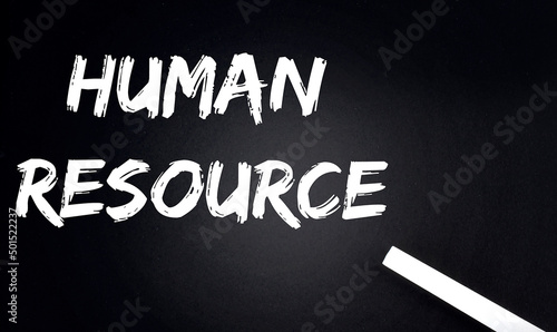HUMAN RESOURCE Text on Black Chalkboard with a piece of chalk