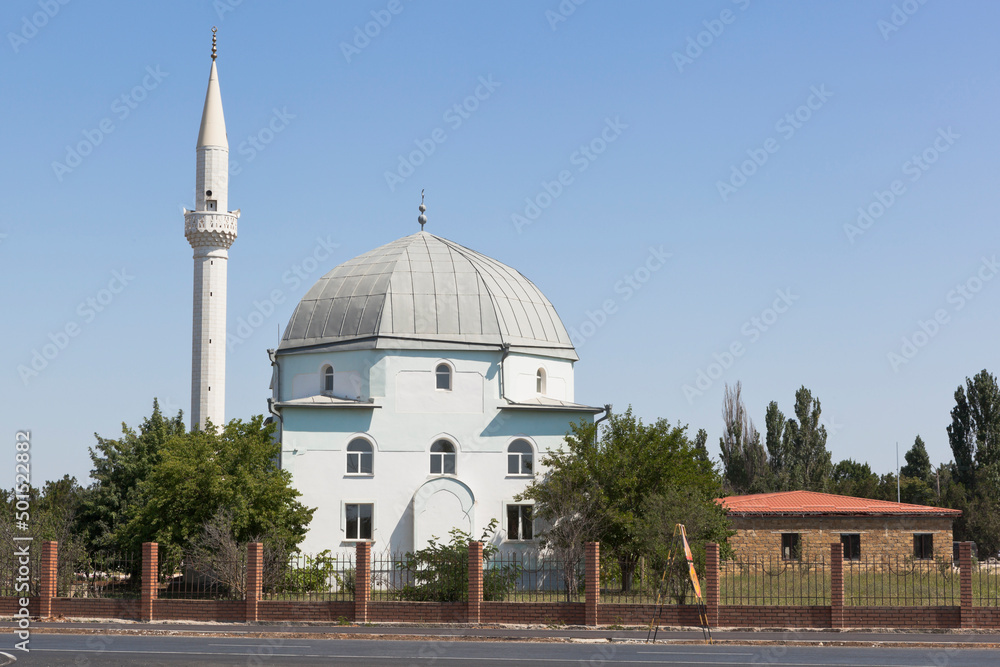 Fototapeta premium View of the Yany Jami mosque from the Evpatoria highway in the city of Saki, Crimea