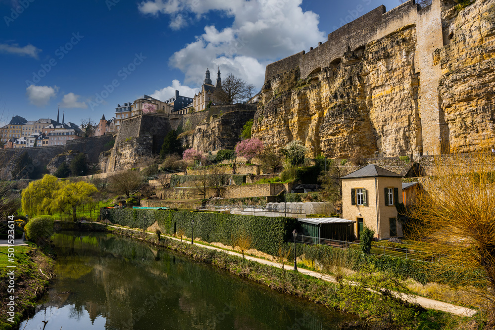Luxembourg, Luxembourg - March 28 2022 - The high part of Luxemburg seeen from the Alzette river Luxembourg, Luxembourg - March 28 2022 - The high part of Luxemburg seeen from the Alzette river