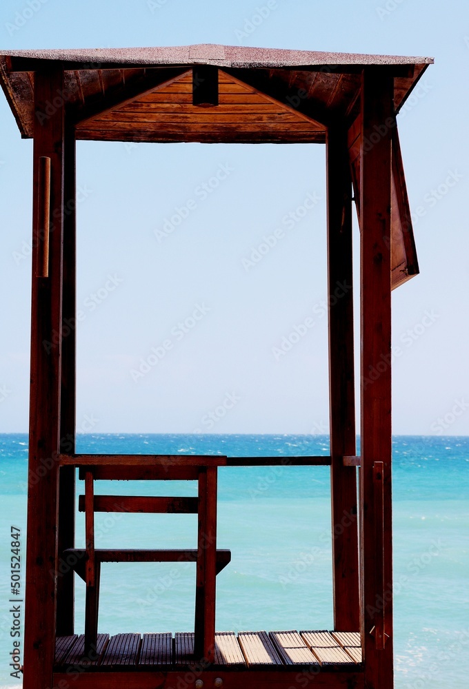wooden chair on the beach