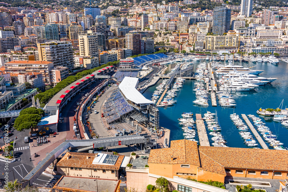 Monaco, Monaco - April 5 2022 - Overview of the port Hercule harbour with the Grand Prix circuit being build - obrazy, fototapety, plakaty 