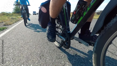 Male's leg riding bicycle. Concept activity, health, sports, relax vacation travel. Action camera go pro. Man riding bicycle in Armenia, Caucasus.
