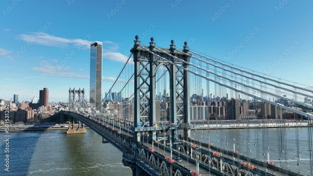 aerial up over Manhattan Bridge revealing Manhattan skyline skyscrapers New York City aerial up over Manhattan Bridge revealing Manhattan skyline skyscrapers New York City