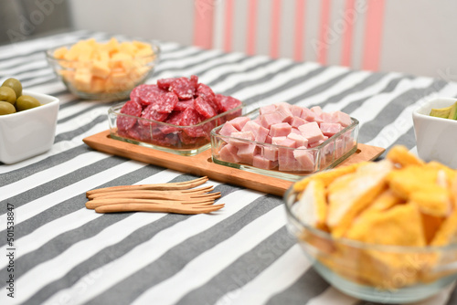 Selective focus of a picada with cold cuts and copy space. photo