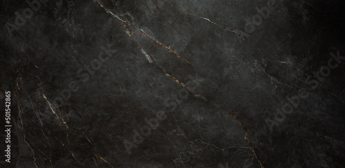 black marble background. black Portoro marble wallpaper and counter tops. black marble floor and wall tile. black travertine marble texture.