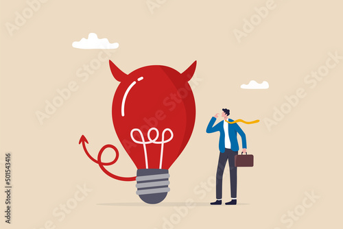 Bad idea cause problem and failure, stupid mistake or poor idea, disappointment from rejected, evil and negative opinion concept, confused businessman looking at devil lightbulb doubting it bad idea. photo