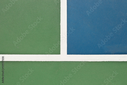 Blue and green tennis, paddle ball, basketball, pickleball court sports and recreation concept