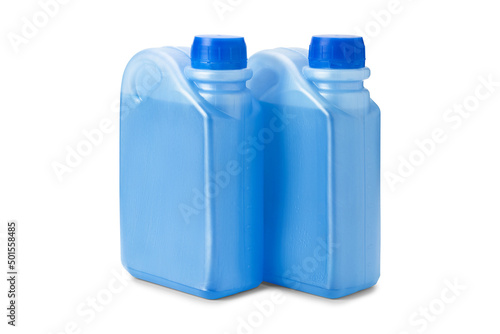 Two plastic bottles with blue antifreeze or coolant water isolated on white background. Canisters of non-freezing liquid, mock up, copy space. photo