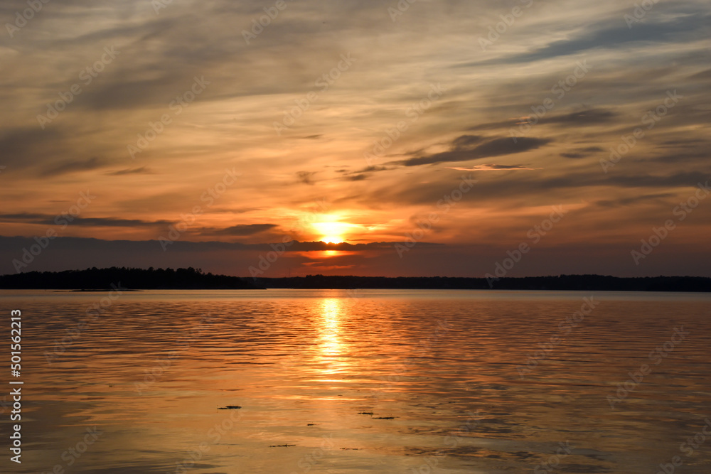 Orange sunset over a lake in Sweden