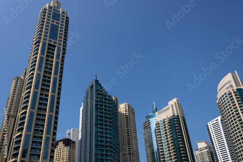 Futuristic skyscrapers against the blue sky, Dubai, UAE © Blazenka