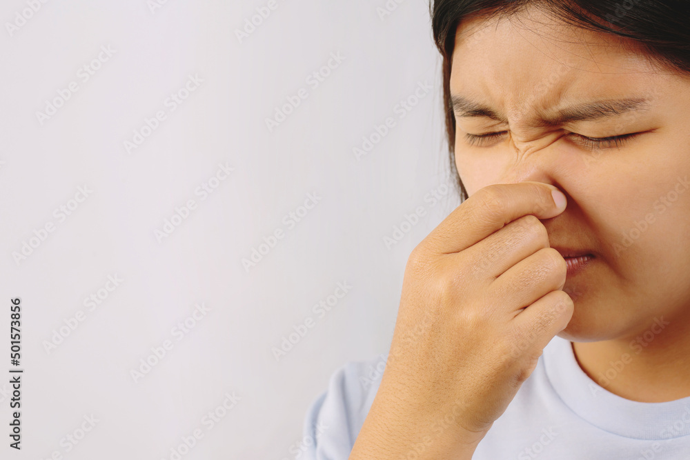 A foul smell when breathing may be caused by. 1. Infections in the nasal cavity such as colds, flu, sinusitis. A foul smell when breathing may be caused by. 1. Infections in the nasal cavity such as colds, flu, sinusitis.