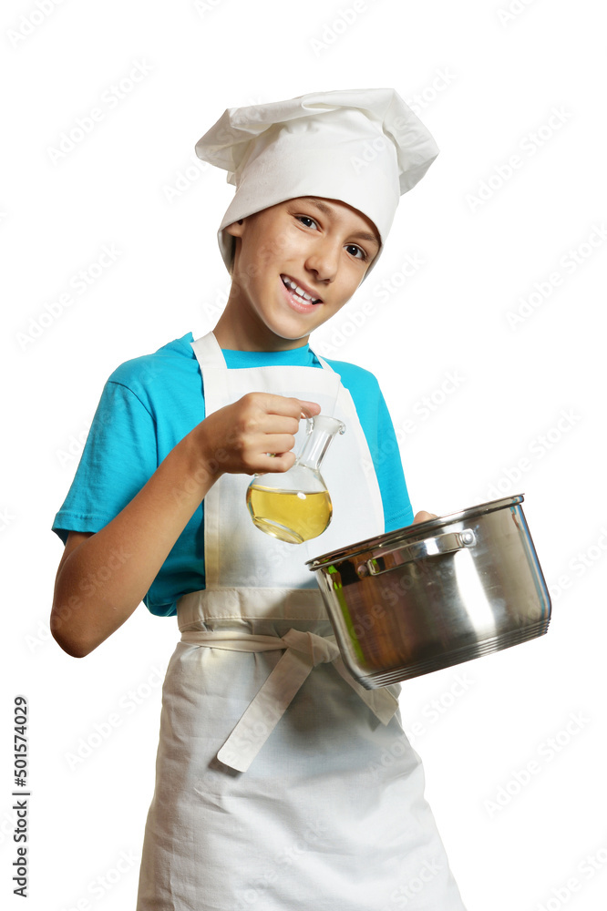 Portrait of little boy wearing chef uniform on white background Portrait of little boy wearing chef uniform on white background