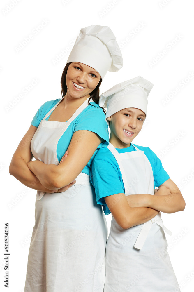 Smiling female chef with assistant on white background Smiling female chef with assistant on white background