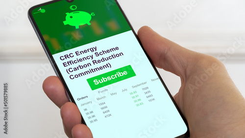 Tax reduction scheme, incentives to invest. Help to invest for the low carbon emission. CRC crc energy efficiency scheme. Carbon reduction commitment form on phone.. photo