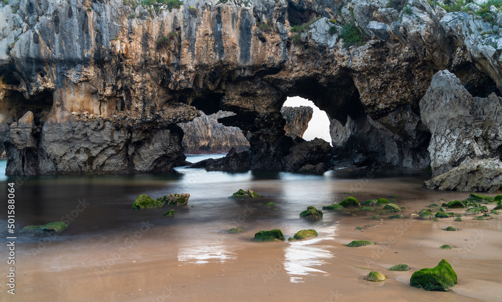 Fototapeta premium the Playa de Cuevas del Mar beach in northern Spain