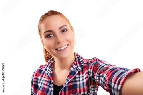 Young smiling woman taking a selfie