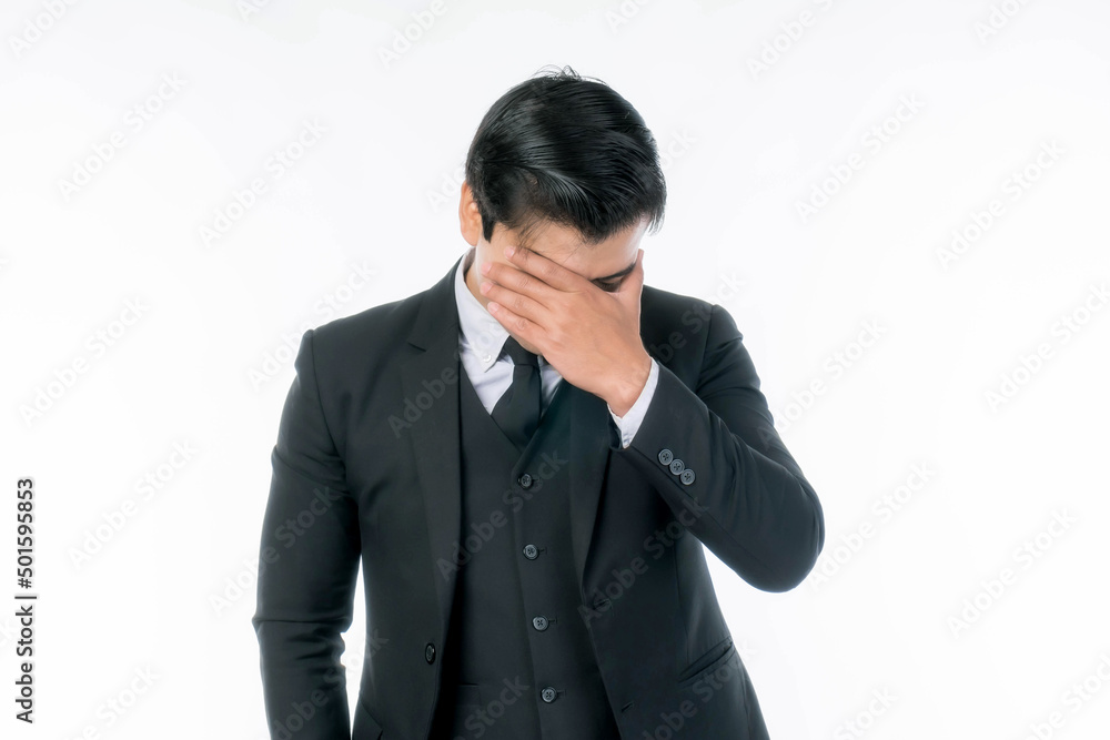 Portrait working Asian business handsome man ware suit is stressed from work on white background with copy space - business concept Portrait working Asian business handsome man ware suit is stressed from work on white background with copy space - business concept