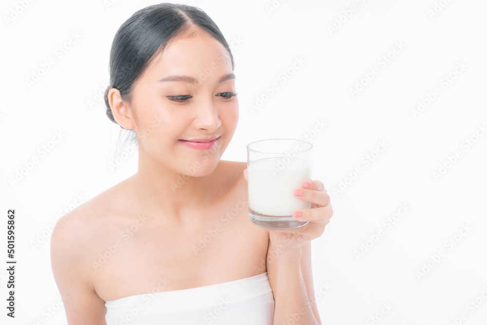 beauty Asian woman cute girl feel happy drinking milk for good health in the morning on white background - lifestyle beauty woman concept beauty Asian woman cute girl feel happy drinking milk for good health in the morning on white background - lifestyle beauty woman concept