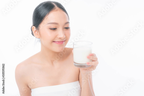 beauty Asian woman cute girl feel happy drinking milk for good health in the morning on white background - lifestyle beauty woman concept