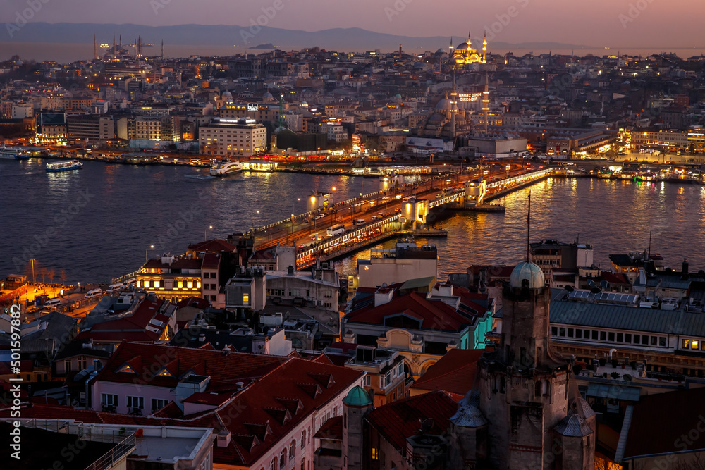 Sunset over the Istanbul landscape. Galata Bridge.