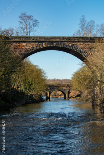 Viaduct and aquaduct over river in Salford photo