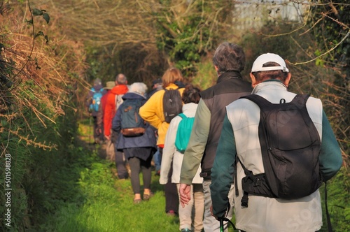 Senior hikers on a path in Brittany-France