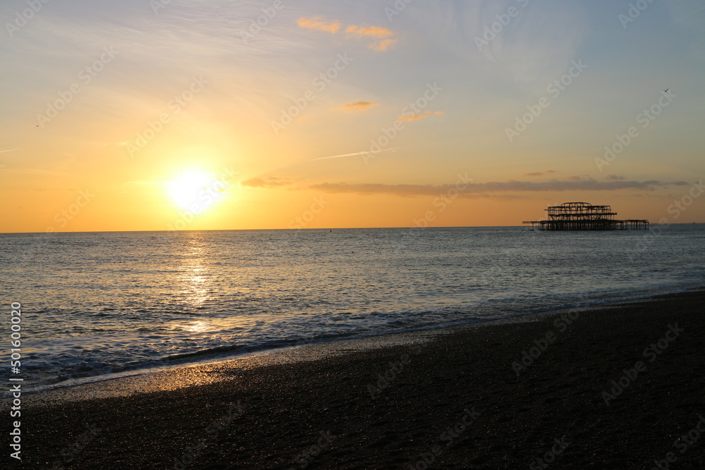 Sunset landscape in Brighton ocean, beach 
