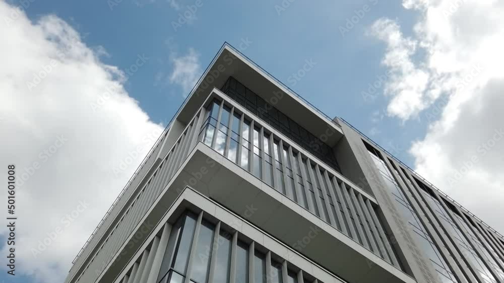 Exterior of a high-rise apartment building facade, windows and balconies. Exterior of a high-rise apartment building facade, windows and balconies.