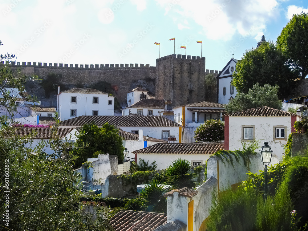Fototapeta premium Obidos, Portugal. View of the town, the medieval walls, and historic houses