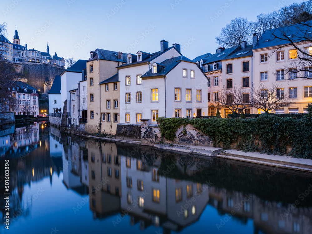 Charming old town of Luxembourg on Alzette river illuminated at night