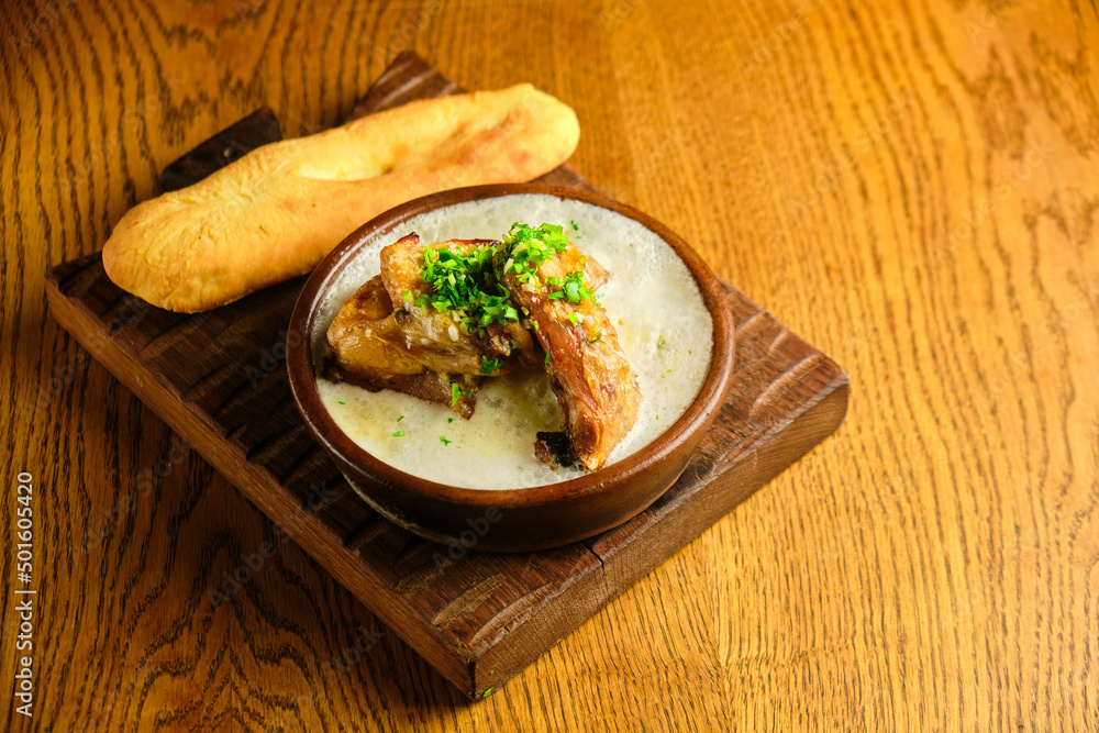 Butadon, Japanese rice bowl dish consisting of bowl of rice topped with pork belly simmered surved with with Japanese oden soup. Butadon, Japanese rice bowl dish consisting of bowl of rice topped with pork belly simmered surved with with Japanese oden soup.