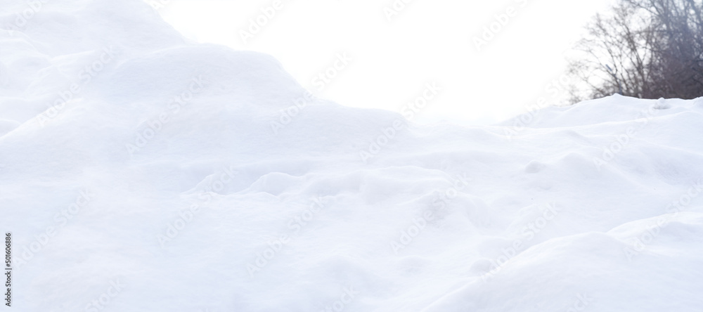 A podium made of snow. White snow on a frosty winter day, close-up. Natural background. High quality photo