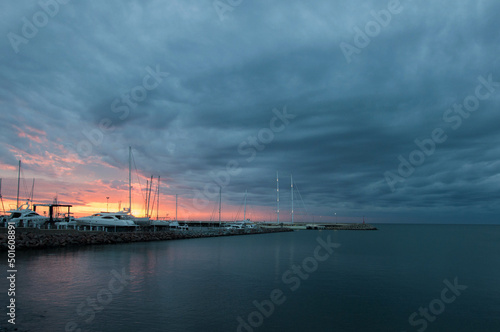 sunset over the harbor in uruguay