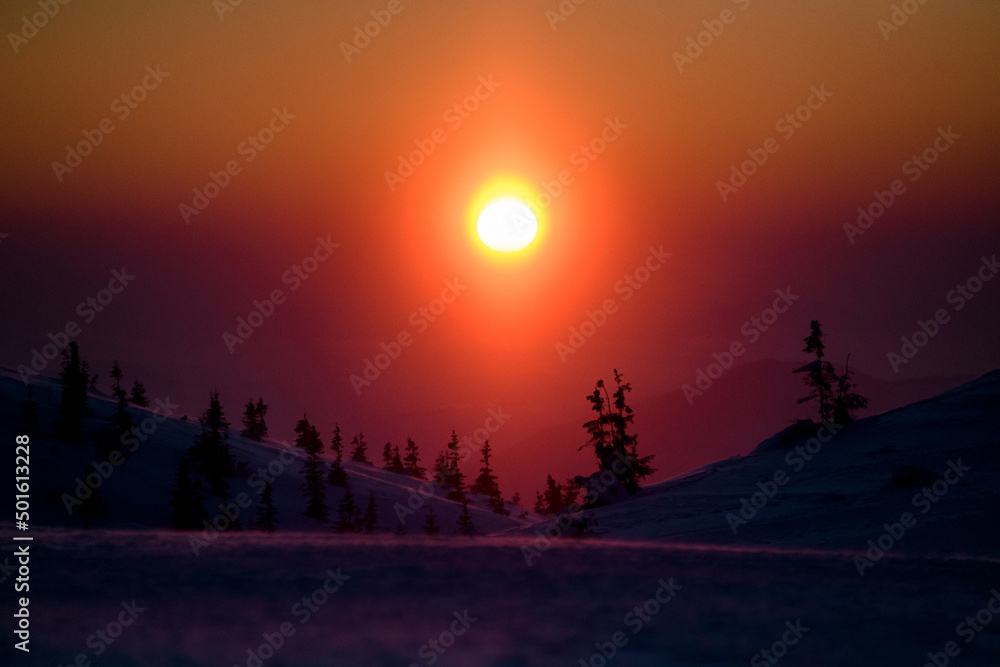 Beautiful view on colorful sunrise in Ukrainian Carpathian mountains.