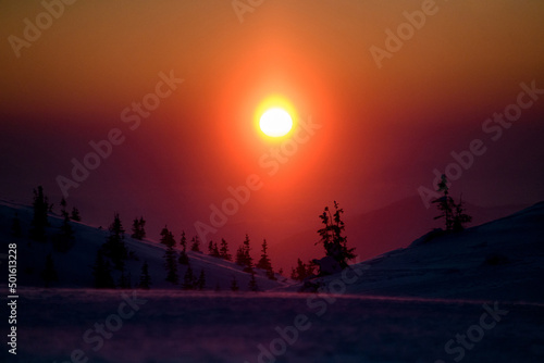 Beautiful view on colorful sunrise in Ukrainian Carpathian mountains.