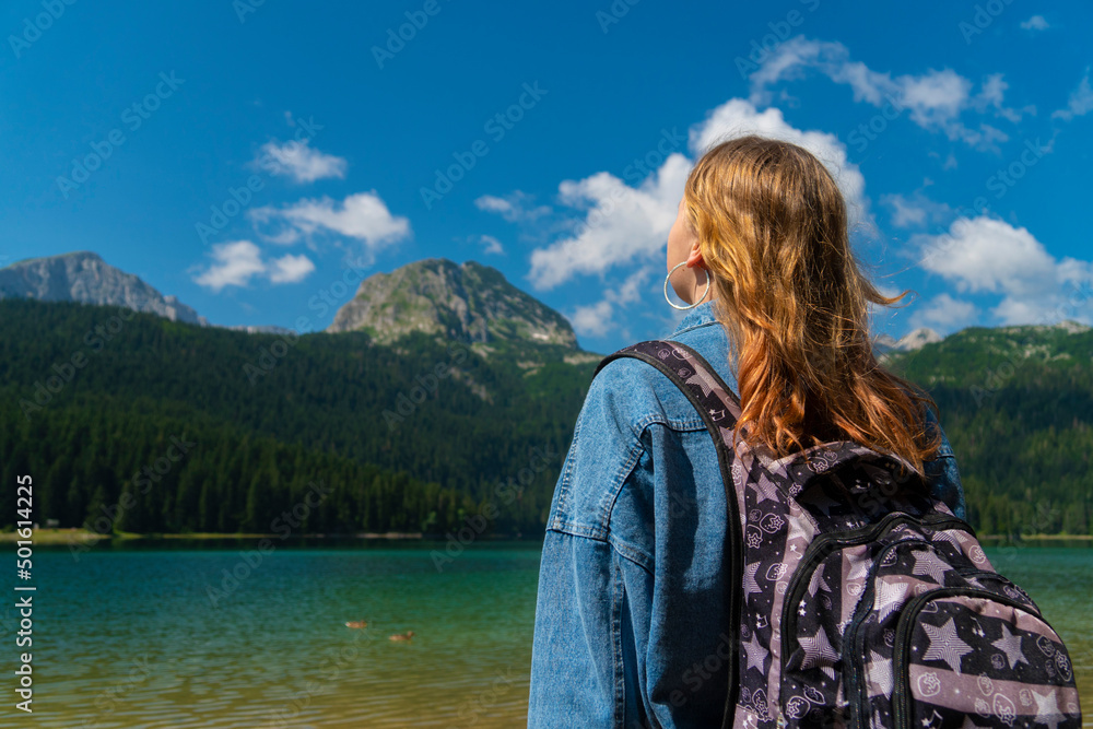 Montenegro. Zabljak. Durmitor National Park. Popular tourist spot. The girl enjoys a beautiful view. Beauty of nature concept background