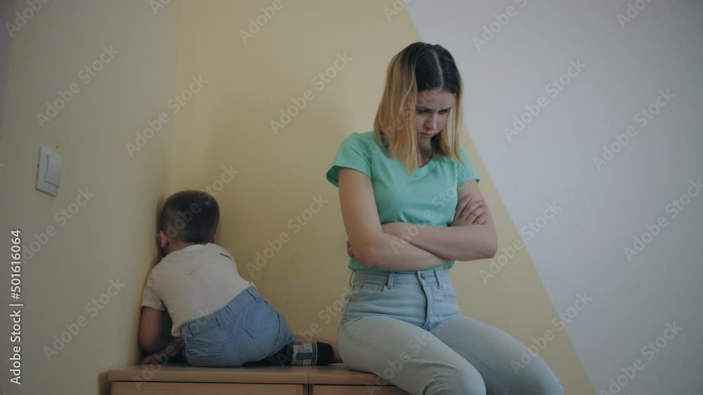 Resentment and quarrel between mother and little son, boy crying in