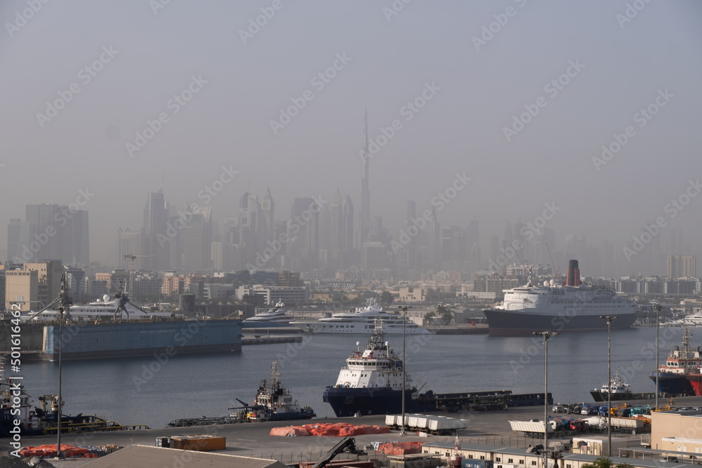 View of Dubai Port with Burj Khalifa as background
