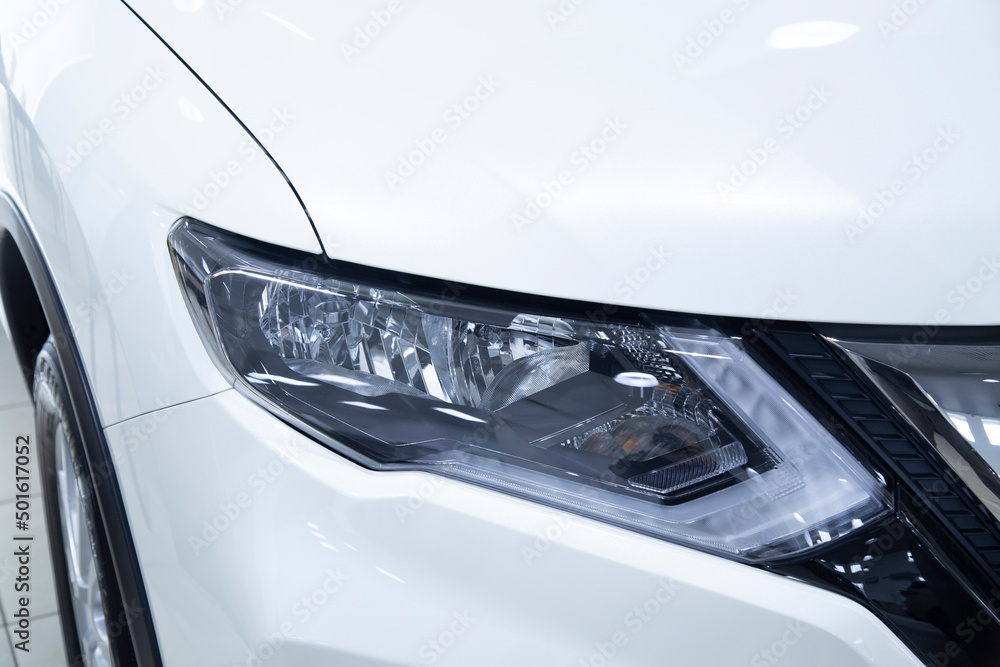 The car's front headlights. Car accessories. Spare parts for cars.